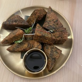 When In Bangkok - Some type of fritters (crunchy on the outside and soft in the inside) - Thai Near Me - Flushing, New York When In Bangkok - Some type of fritters (crunchy on the outside and soft in the inside) - Thai Near Me - Flushing, New York