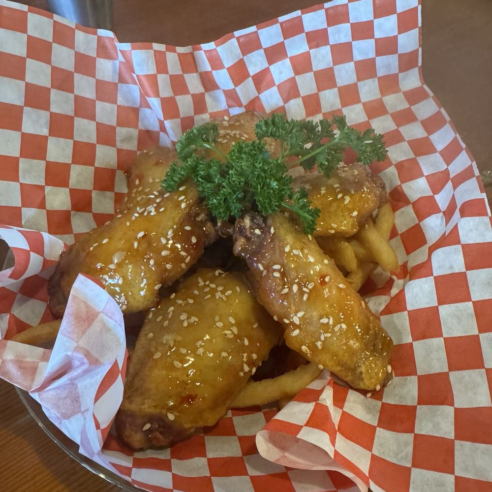 Sweet chili chicken wings with french fries Sweet chili chicken wings with french fries