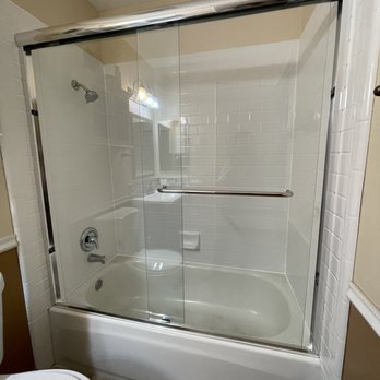 Artisan Builders Group - a bathroom with a tub and toilet - General Contractors Near Me - San Jose, California