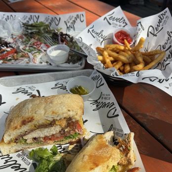 Revelry Kitchen + Bar - Chicken pesto SW and elevated house salad - American Near Me - Austin, Texas