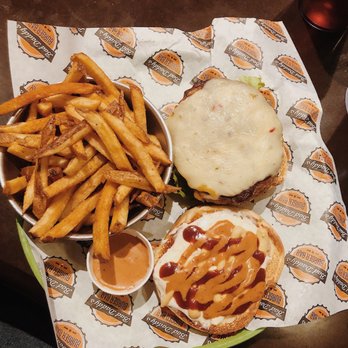 Bad Daddy's Burger Bar - Turkery burger with lots of sauce! - Bars Near Me - Roswell, Georgia Bad Daddy's Burger Bar - Turkery burger with lots of sauce! - Bars Near Me - Roswell, Georgia