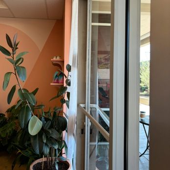 Twee Coffee - entrance + plants by the door - Coffee & Tea Near Me - Riverside, California