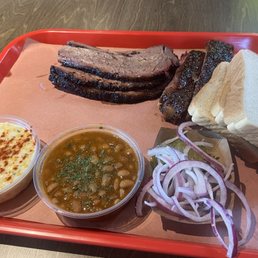 Brisket, cream corn, pinto beans , & ribs Brisket, cream corn, pinto beans , & ribs