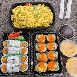 Masa Sushi & Asian Grill - Singapore chicken Noodles. 2 orders of spicy salmon rolls and a village roll. Sauce on side.