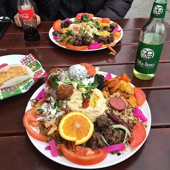 Al-Andalos - Al andalos platter, which samples many menu items such as kofta, falafel, hummus and sausage - Food Stands Near Me - Berlin, BE