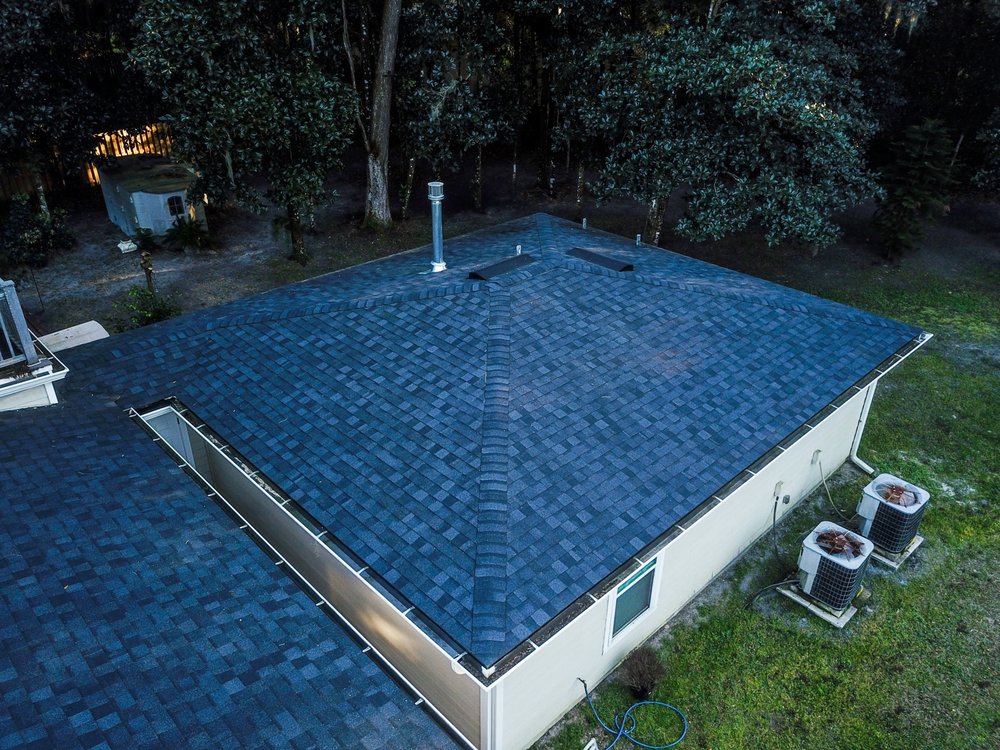 Slide of Action Roofing