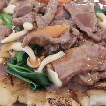 Wing Kee - Beef with fried Chow fun. Not convinced this is actually the name, but the pancake like carbs below are indeed Chow fun! - Cantonese Near Me - Houston, Texas Wing Kee - Beef with fried Chow fun. Not convinced this is actually the name, but the pancake like carbs below are indeed Chow fun! - Cantonese Near Me - Houston, Texas