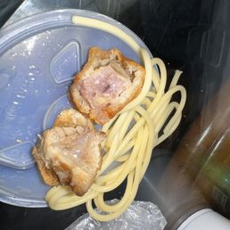 Discolored chicken and spaghetti noodles, chicken looks like it's been cooked for days Discolored chicken and spaghetti noodles, chicken looks like it's been cooked for days