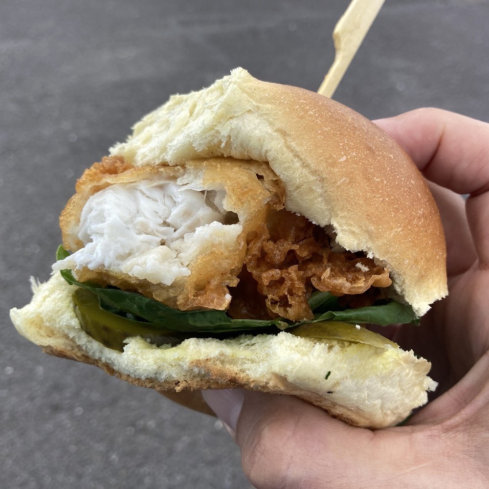 Dingle Ahoy - Fish burger with bite taken out. Showing how thick the fish was. Highly recommend this burger! - Fish & Chips Near Me - Dingle, Kentucky Dingle Ahoy - Fish burger with bite taken out. Showing how thick the fish was. Highly recommend this burger! - Fish & Chips Near Me - Dingle, Kentucky