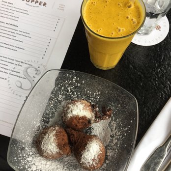 Supper - Turmeric ginger hemp almond milk smoothie with ricotta bignees - New American Near Me - San Antonio, Texas Supper - Turmeric ginger hemp almond milk smoothie with ricotta bignees - New American Near Me - San Antonio, Texas