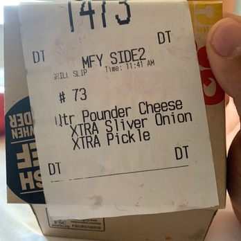 McDonald's - a hand holding a ticket for a burger - Fast Food Near Me - West Valley, Utah