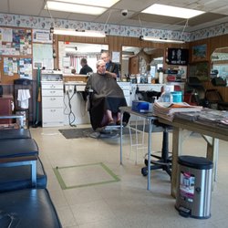 Main Barber Shop - Johnnie just finishing up... great job!!