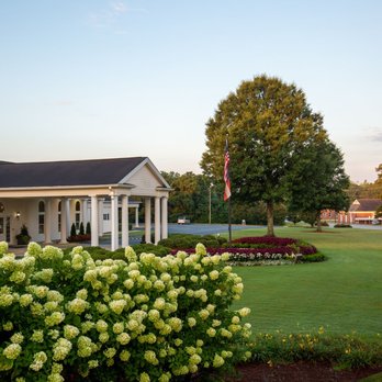 McMullen Funeral Home and Crematory - Portico framed by hydrangeas - Funeral Services & Cemeteries Near Me - Columbus, Georgia McMullen Funeral Home and Crematory - Portico framed by hydrangeas - Funeral Services & Cemeteries Near Me - Columbus, Georgia