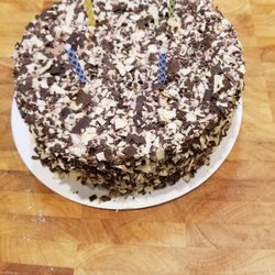 Bread and Chocolate - Fantastically moist, luscious "tuxedo" cake with milk chocolate and white mousse inside.