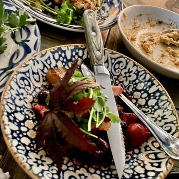 Aba - Roasted Pork Belly -- delicious with the roasted garlic, black cherries, and saba vinaigrette - Mediterranean Near Me - Chicago, Illinois