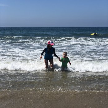 Perfect Day Surf Camp - Jojo helping our little girl work out her fear of the ocean. - Surfing Near Me - Santa Monica, California Perfect Day Surf Camp - Jojo helping our little girl work out her fear of the ocean. - Surfing Near Me - Santa Monica, California