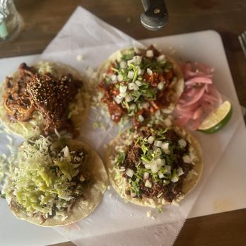 BOCA by Chef Maria Mazon - Left to right: Mole, al pastor, puerco verde, and barbacoa. - Mexican Near Me - Tucson, Arizona BOCA by Chef Maria Mazon - Left to right: Mole, al pastor, puerco verde, and barbacoa. - Mexican Near Me - Tucson, Arizona