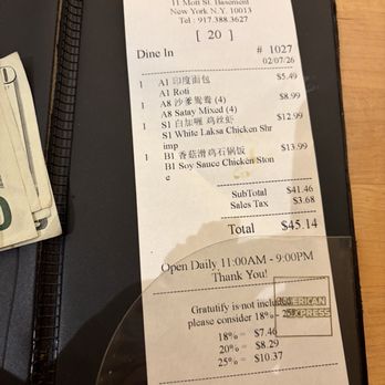 Wok Wok - Our bill -thank goodness I had cash 4% surcharge fur cc is disgusting - Malaysian Near Me - New York, New York