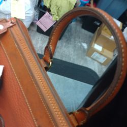 Platos Closet - Old Dooney and Bourke handbag asking price $30