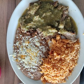 Fiesta Bamba - Carnitas lunch special with refried beans and rice.  Fiesta Bamba/ Arcade - Mexican Near Me - Arcade, New York