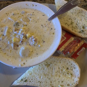 Rainier Bar & Grill - Clam chowder bowl with garlic bread - Bars Near Me - Enumclaw, Washington Rainier Bar & Grill - Clam chowder bowl with garlic bread - Bars Near Me - Enumclaw, Washington