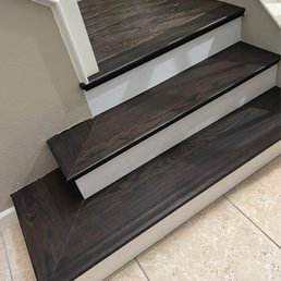 Wooden stair treads and wooden risers.