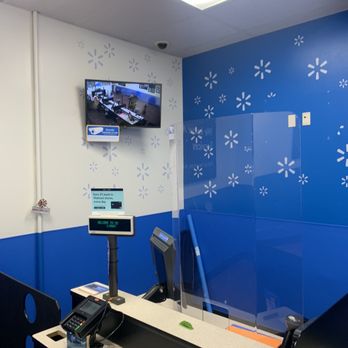 Walmart Supercenter - a desk with a tv on the wall - Department Stores Near Me - West Palm Beach, Florida Walmart Supercenter - a desk with a tv on the wall - Department Stores Near Me - West Palm Beach, Florida