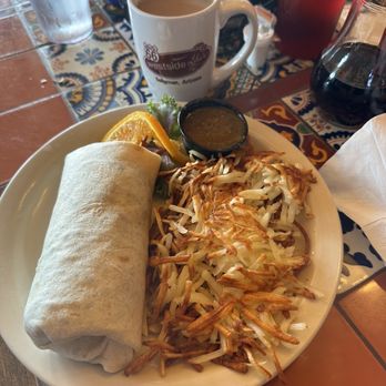 Westside Lilo's Cafe - The chorizo egg burrito and hash browns. My husband said it has a good spicy kick to it. - Breakfast & Brunch Near Me - Seligman, Arizona Westside Lilo's Cafe - The chorizo egg burrito and hash browns. My husband said it has a good spicy kick to it. - Breakfast & Brunch Near Me - Seligman, Arizona