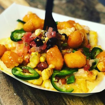 Lachine Cuisine - Loaded cheese fries with buffalo hushpuppies - Caterers Near Me