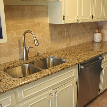 Fox Granite - Napolean kitchen countertop with 4"x6" travertine tile backsplash - Building Supplies Near Me - San Antonio, Texas
