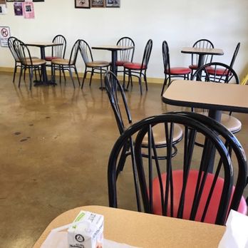 Grand Donuts - tables and chairs in a restaurant - Donuts Near Me - Cibolo, Texas