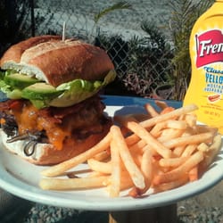 Mama Bear's Pizza - Fully Loaded Burger, with a choice of salad or french Fries. Friday's special $85 pesos from 12:00 pm to 4:00 pm.