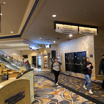 Xavier Mortimer - See the signs: These are the escalators by Nosh Restaurant to get to the Magic Attic Theater - Performing Arts Near Me