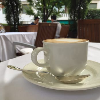 The Westin Palace, Milan - Cappuccino on the mezzanine terrace - ambiance better than the food - Hotels Near Me - Milan, Michigan