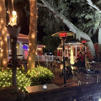 The Raintree Restaurant - Gorgeous photo of exterior outdoor alfresco sitting area - American Near Me - Saint Augustine, Florida