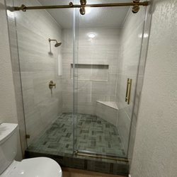 Local Glass & Screen - Slide door and fixed panel barn style shower. Dana Point , California. Local Glass & Screen company.