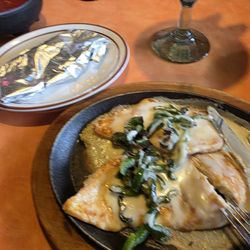 El Campesino - Grilled chicken with bell peppers and cheese sauce with refried beans and rice and flour tortilla... delicious!