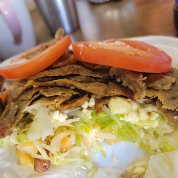 Chicago Gyros - Load Gyro Fries-not pic is a extra cup Taziki sauce Also i forgot to take a pic before i started eating. The whole plate was full. - Greek Near Me - Oak Grove, Kentucky Chicago Gyros - Load Gyro Fries-not pic is a extra cup Taziki sauce Also i forgot to take a pic before i started eating. The whole plate was full. - Greek Near Me - Oak Grove, Kentucky