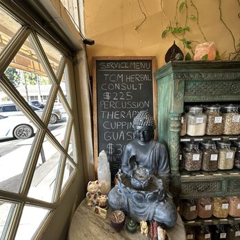 The Healing Tree - meditating Buddha statue, Smudging, service menu, crystal, Teas,   Himalayan Pink salt lamp , plants - Coffee & Tea Near Me - Thousand Oaks, California