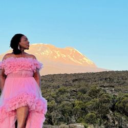 Black Adventure Collective - Zippora phot shoot in front of Mount Kilimanjaro