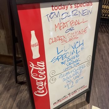 Oz Pizza - a sign with a coca cola advertisement on it - Pizza Near Me - East Point, Georgia Oz Pizza - a sign with a coca cola advertisement on it - Pizza Near Me - East Point, Georgia