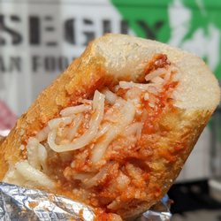 WiseGuy Italian Street Food - Meatball Provolone Sandwich - Three homemade meatballs with Wiseguy marinara sauce, on top with Provolone and Pecorino Romano cheese.