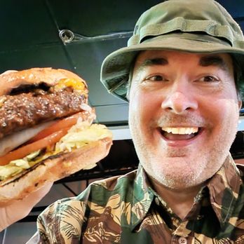 Tavern On Vets - eating delicious burger - Burgers Near Me - Kenner, Louisiana Tavern On Vets - eating delicious burger - Burgers Near Me - Kenner, Louisiana