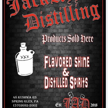 Jack Azz Distilling - a black brick wall with red lettering - Distilleries Near Me - Spring Glen, Pennsylvania