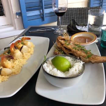 Nine One Five - Fish and scallops on a bed of risotto and whole fried yellow snapper - New American Near Me - Key West, Florida Nine One Five - Fish and scallops on a bed of risotto and whole fried yellow snapper - New American Near Me - Key West, Florida