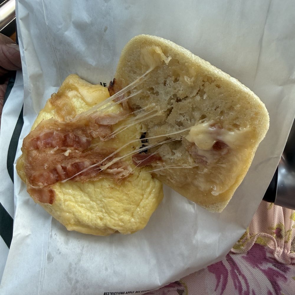 Starbucks - Double-Smoked Bacon, Cheddar & Egg: Applewood-smoked bacon, cage-free egg, and sharp cheddar cheese on a croissant bun. - Coffee & Tea Near Me - North Las Vegas, Nevada Starbucks - Double-Smoked Bacon, Cheddar & Egg: Applewood-smoked bacon, cage-free egg, and sharp cheddar cheese on a croissant bun. - Coffee & Tea Near Me - North Las Vegas, Nevada