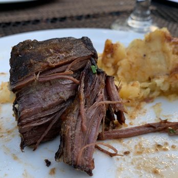 Copper Mug Bar And Grille - Moist and tender braised beef short ribs - American Near Me - Loudonville, Ohio Copper Mug Bar And Grille - Moist and tender braised beef short ribs - American Near Me - Loudonville, Ohio