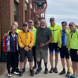 Historic Hotel Greybull - Mayor Myles Foley, last June outside his historic Greybull Hotel, with the WYMPS, a group of cyclists visiting from Boston and Minneapolis.