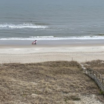 Courtyard by Marriott Carolina Beach Oceanfront - I wish I was this young again. Surfers searching for the perfect ride in front of the Marriott. - Hotels Near Me - Carolina Beach, North Carolina Courtyard by Marriott Carolina Beach Oceanfront - I wish I was this young again. Surfers searching for the perfect ride in front of the Marriott. - Hotels Near Me - Carolina Beach, North Carolina