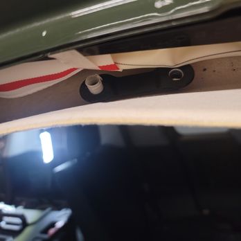 Mullinax Ford - The bracket that was missing. Was wedged between the headliner and upper door latch. - Car Dealers Near Me - Lake Park, Florida Mullinax Ford - The bracket that was missing. Was wedged between the headliner and upper door latch. - Car Dealers Near Me - Lake Park, Florida